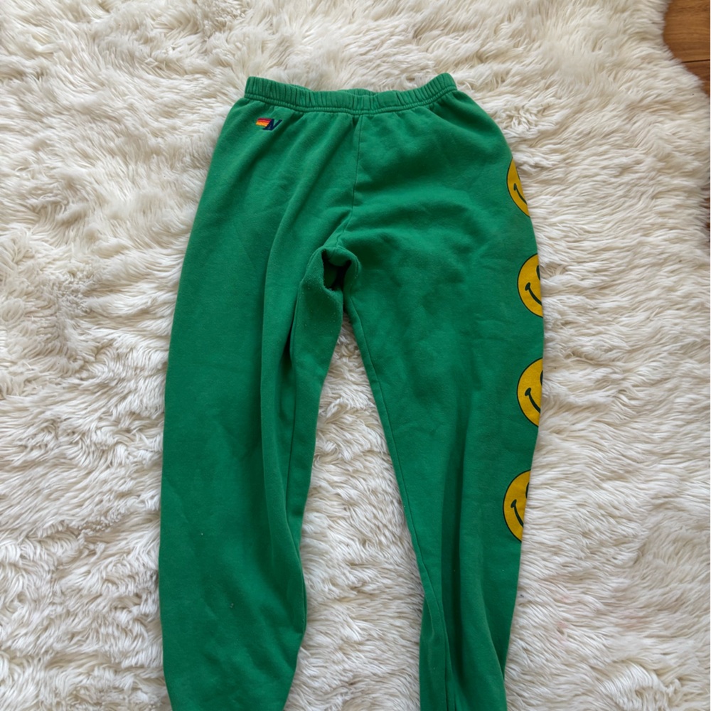 Green smiley Aviator Nation sweatpants